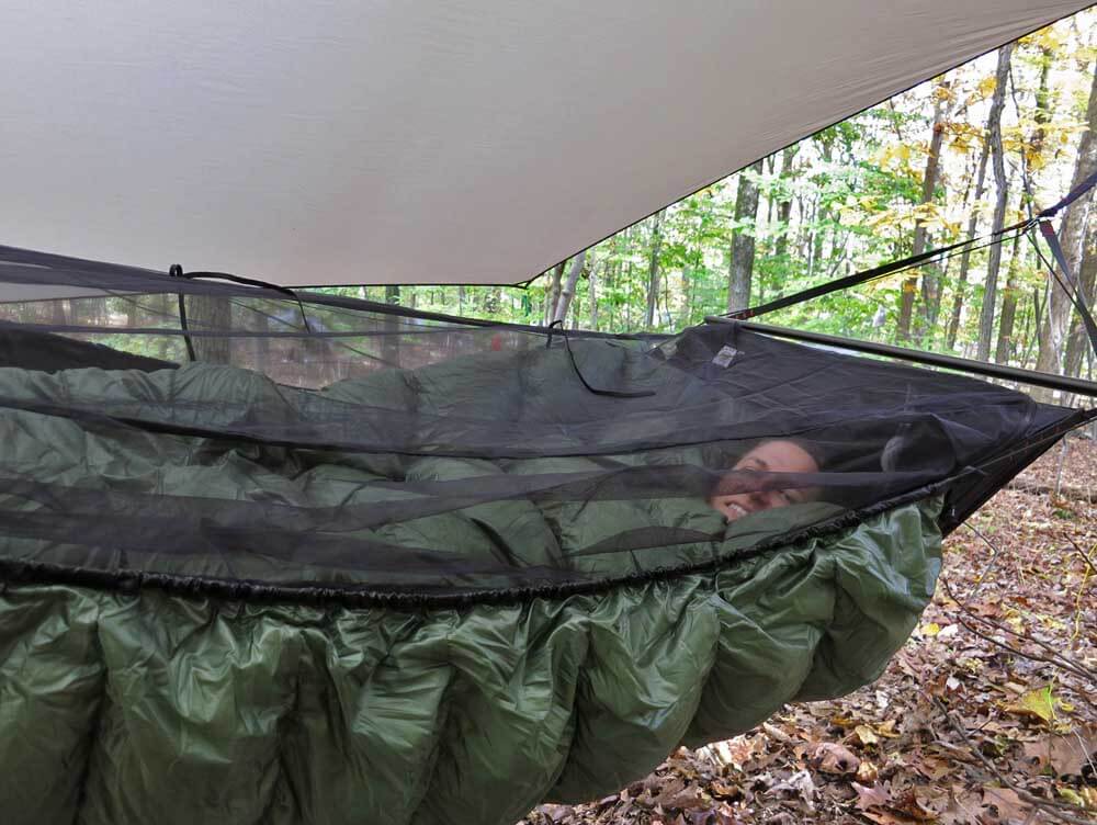 A good top and bottom quilt make all the difference for a warm night’s sleep. Pictured above is my wife, Alison, cocooned in down -- a Jacks R Better High Sierra Sniveller top quilt and Greylock 3 under-quilt.
