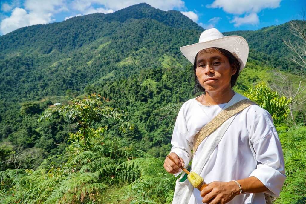 Our Wiwa guide, Celso, with his poporo, a gourd used for carrying crushed seashells (lime).
