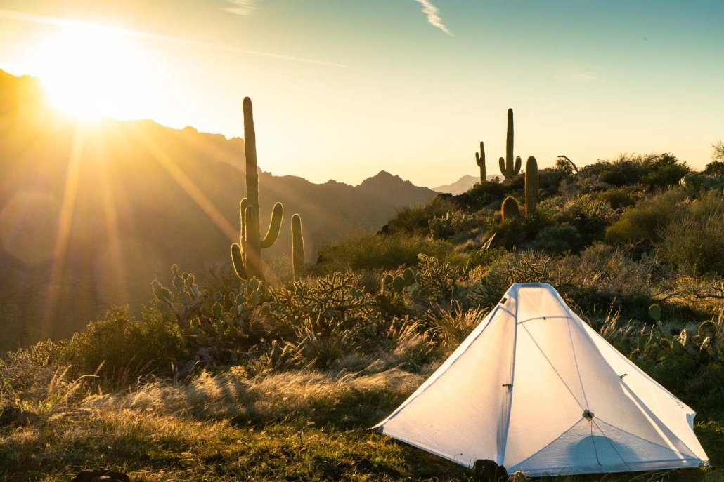 an ultralight tent in the desert at sunrise