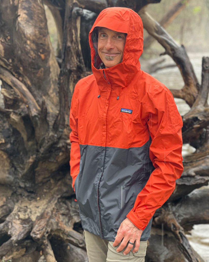 Adventure Alan testing the Patagonia TorrentsShell 3L Rain jacket in red and gray