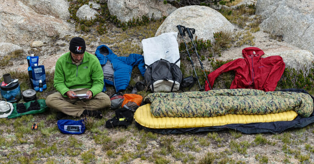 adventure alan 9 pound ultralight gear list laid out at camp