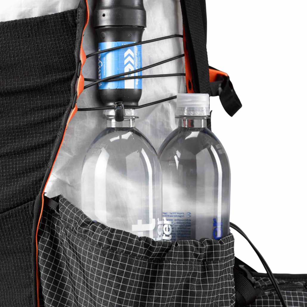 Side-Pocket-Close-Up-with-water-bottles HMG Unbound backpack side pocket close up