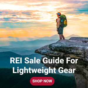 A backpacker using lightweight gear from REI Sale