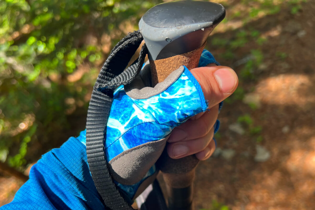 Glacier Gloves Islamorada Gloves-1 holding a trekking pole