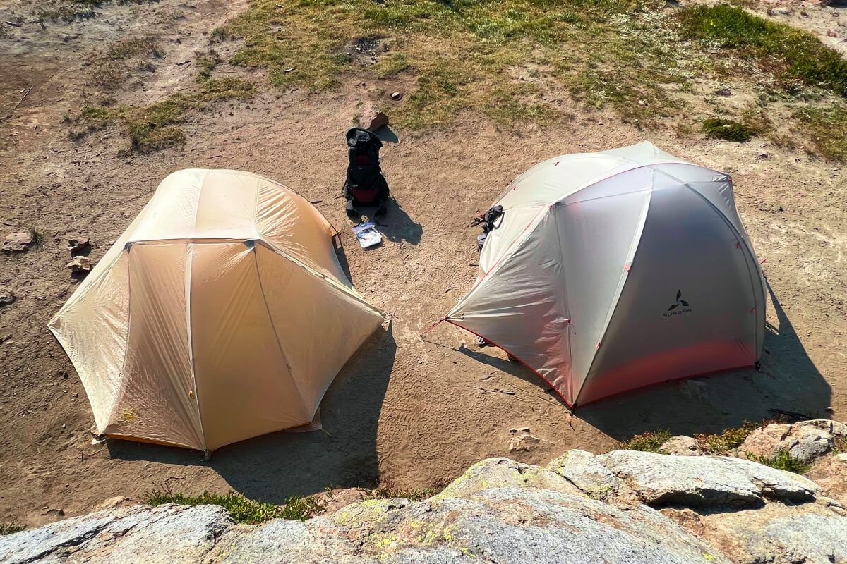 comparing two 3 person backpacking tents from above