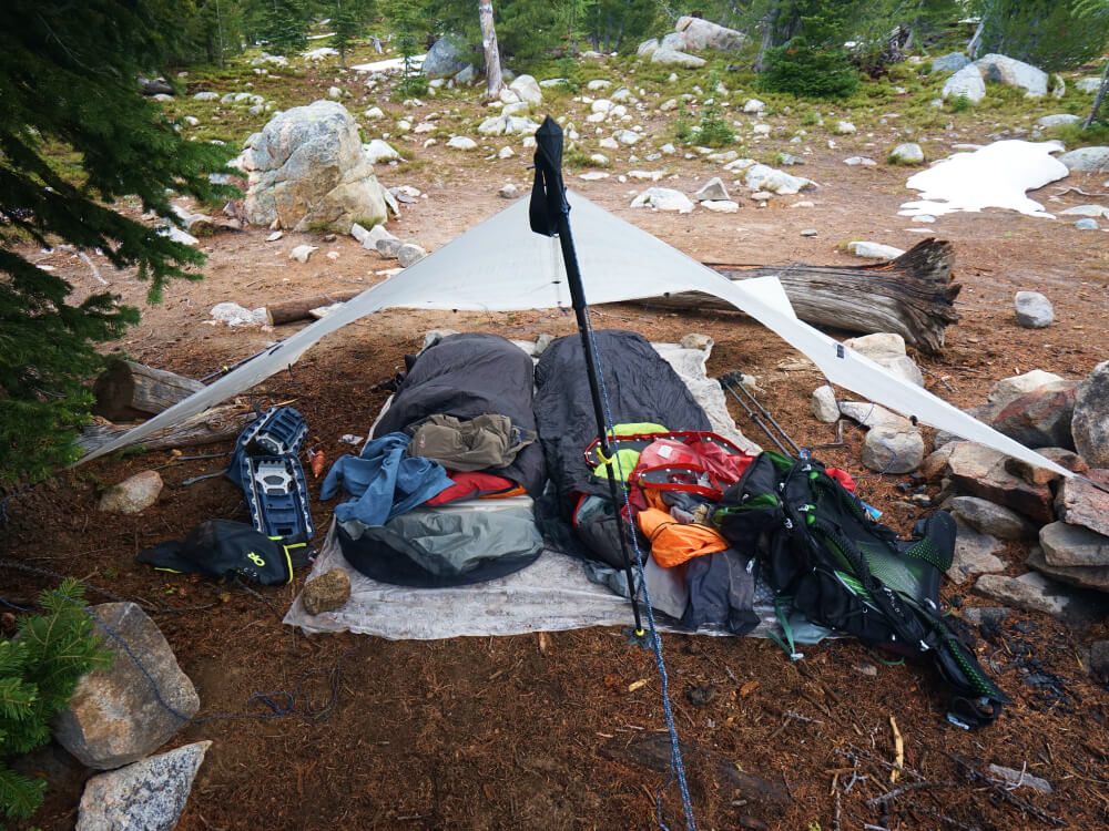 backpacking tarp setup with accessories