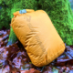 best dry bag for backpacking among wet leaves
