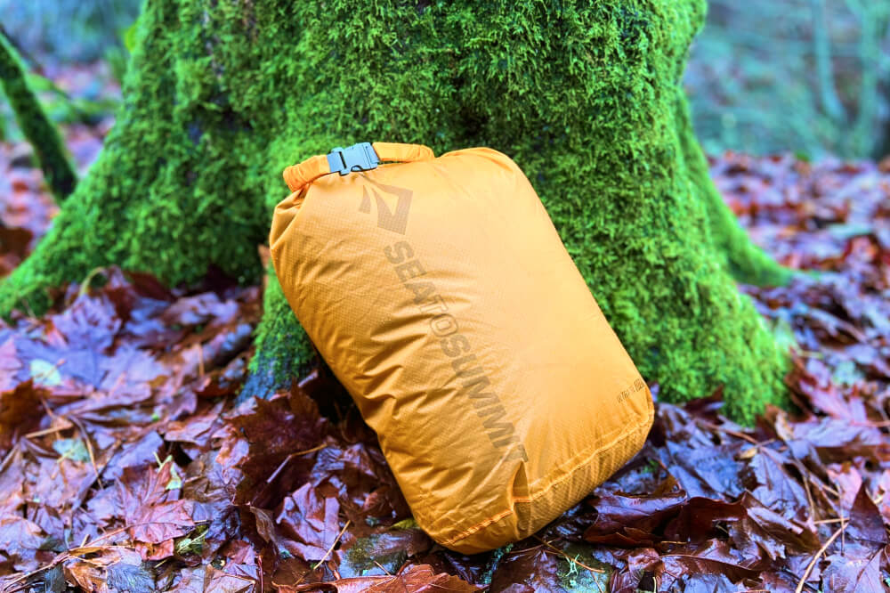 Best dry bag for backpacking against a wet tree