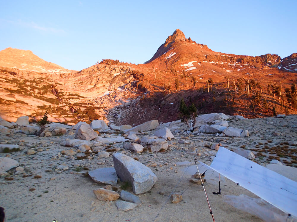 backpacking tarp at sunset backpacking tarp at sunset