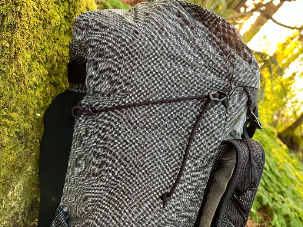 Close up on side strap on black diamond beta light backpack