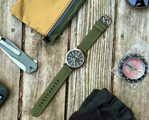 The Best Field Watch For Hiking next to more gear