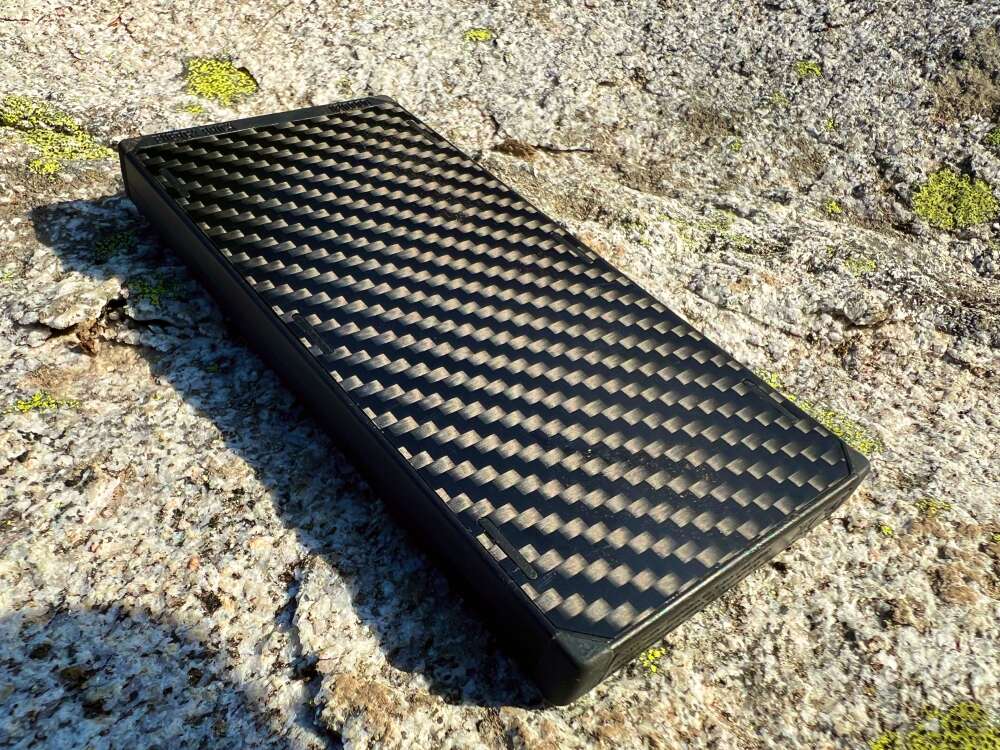 Power bank Nitecore Power bank on a rock