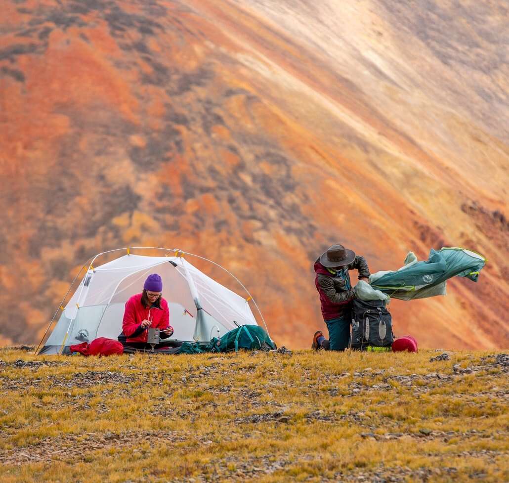 a big agnes backpacking tent in front of a mountainous backdrop