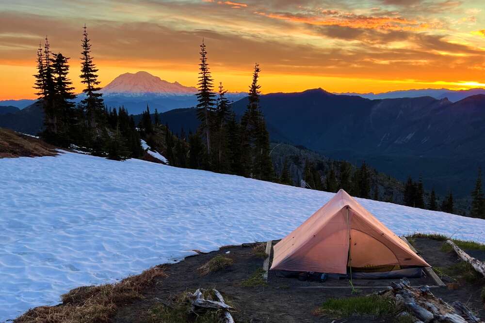 an ultralight 3 person tent at sunset