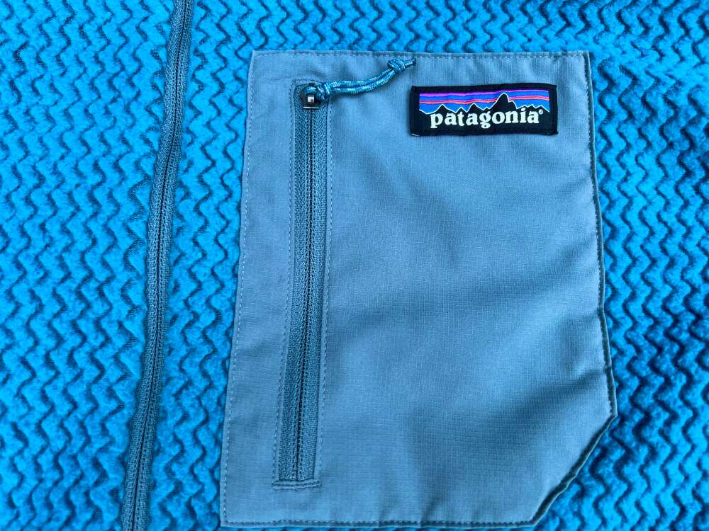 Lightweight Fleece Jacket-2 close up on a lightweight fleece jacket pocket