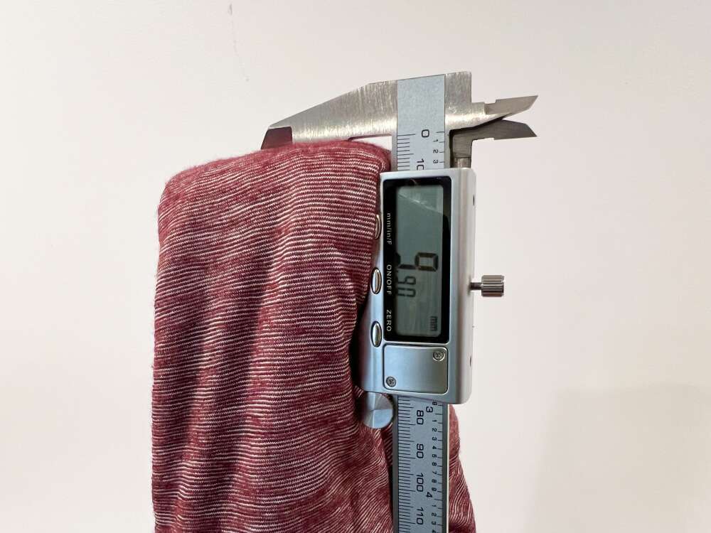 measuring the thickness of a sun hoodie