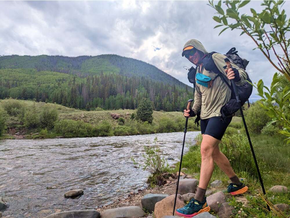 Sun Hoodies-7 fording a river in a merino hoodie