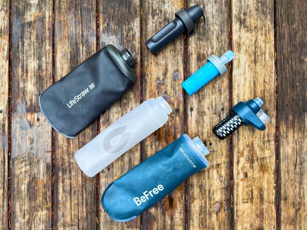 Best Soft Flask Squeeze Filters-3 soft bottles and squeeze filter heads laid out side by side