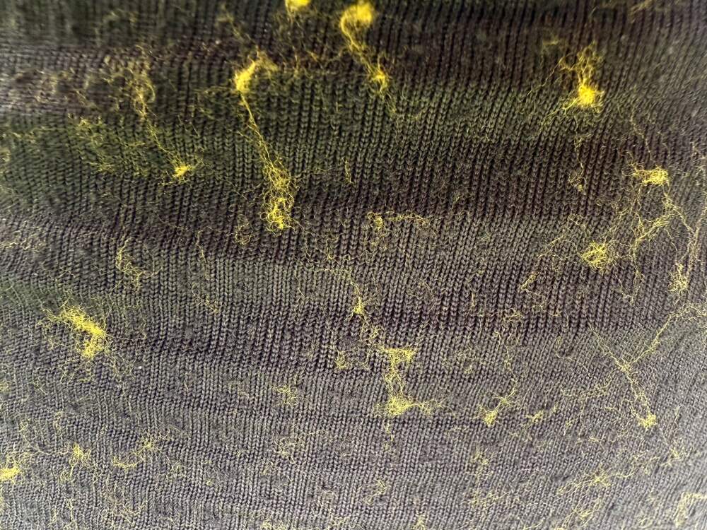 Fuzz shed onto fleece tights during first wear test