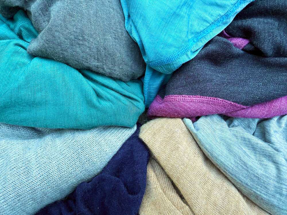 side by side of numerous alpaca vs merino wool fabrics-1 side by side of numerous alpaca vs merino wool fabrics