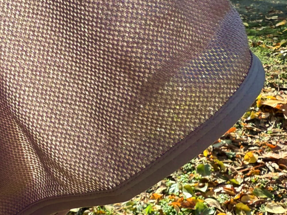 Janji Auras Ultrafleece Review close up light passes through the Janji Auras UltraFleece Hoodie mesh