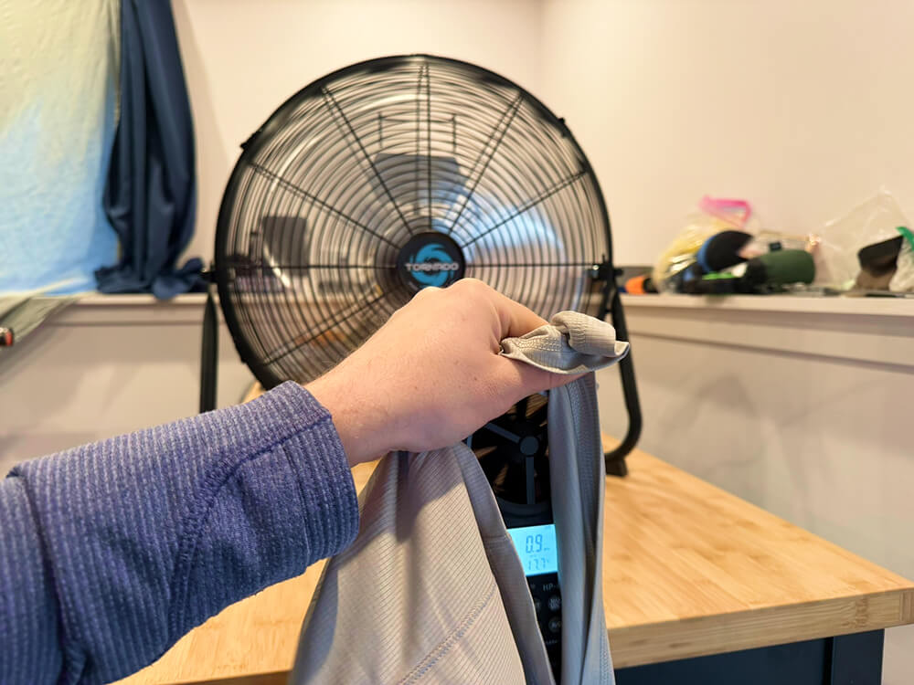 REI Co-op Flash Shade Hoodie Review-4 testing for breathability with anemometer and fan