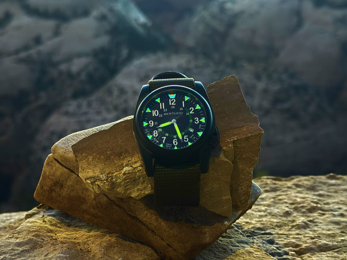 Best Tritium Watches-2 tritium watches glowing against a desert backdrop